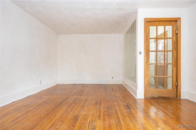 empty room with light wood-type flooring