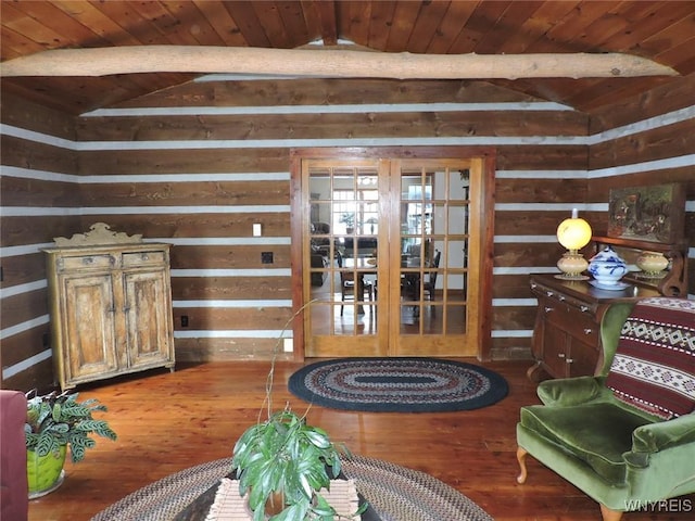 interior space with vaulted ceiling with beams, wooden ceiling, french doors, and dark wood-type flooring