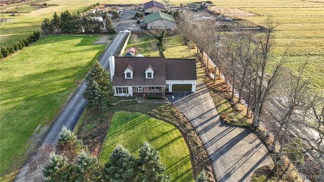 birds eye view of property featuring a rural view