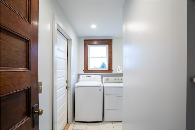 clothes washing area with independent washer and dryer