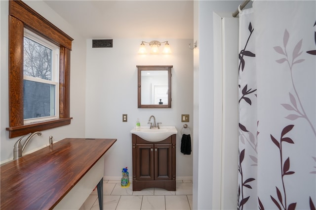 bathroom featuring vanity