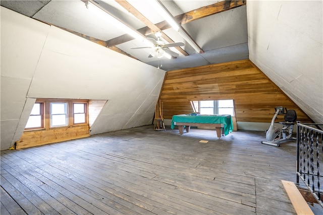 bonus room with ceiling fan, a healthy amount of sunlight, lofted ceiling, and hardwood / wood-style flooring