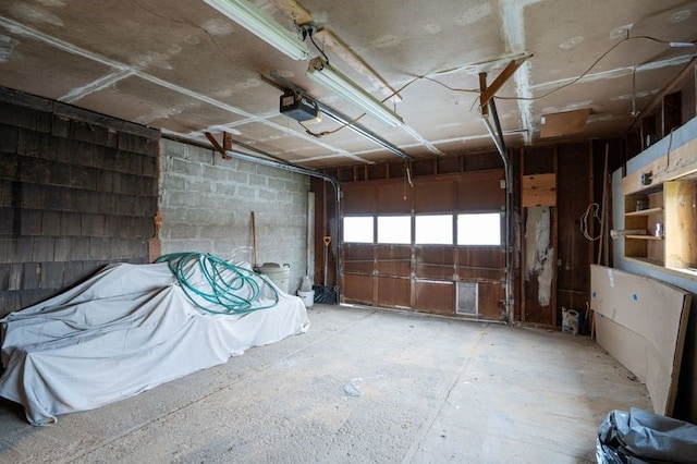 garage featuring a garage door opener