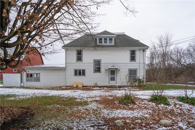 view of snow covered house