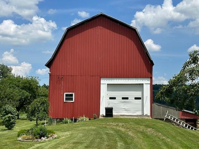 garage with a yard