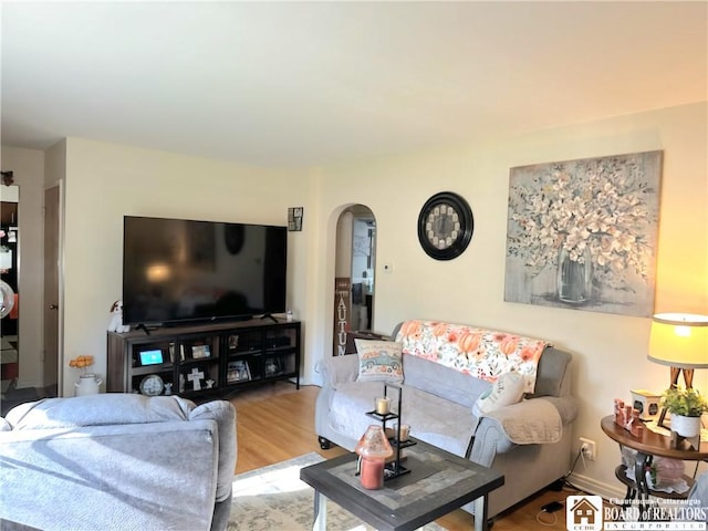 living room with light hardwood / wood-style floors