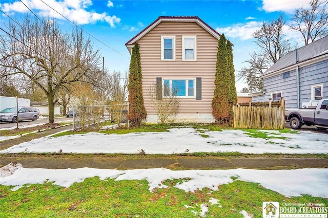 view of snow covered property