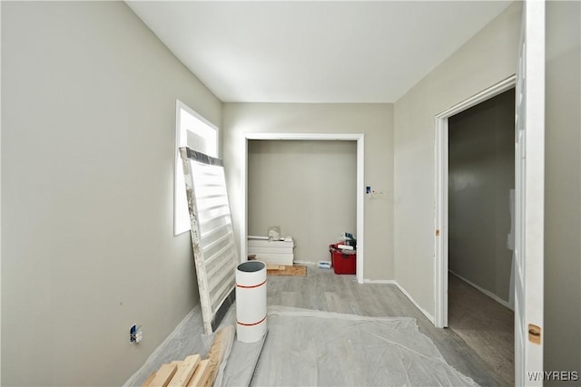 hallway featuring light wood-type flooring