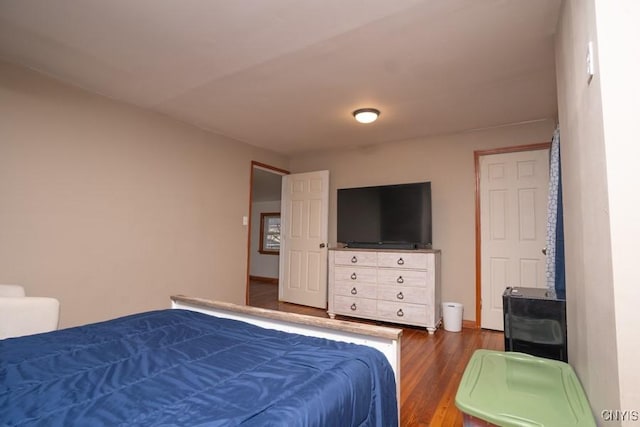 bedroom featuring dark hardwood / wood-style floors