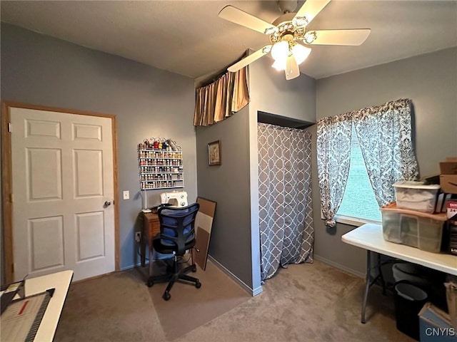 carpeted office with ceiling fan