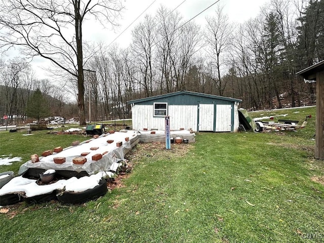 view of outbuilding with a yard