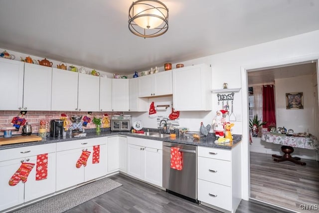 kitchen with dishwasher, white cabinets, and dark wood-type flooring