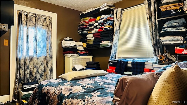 bedroom with a textured ceiling