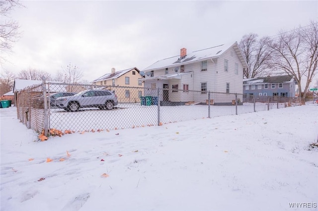 view of yard covered in snow