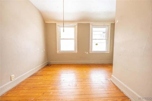 spare room with light wood-type flooring