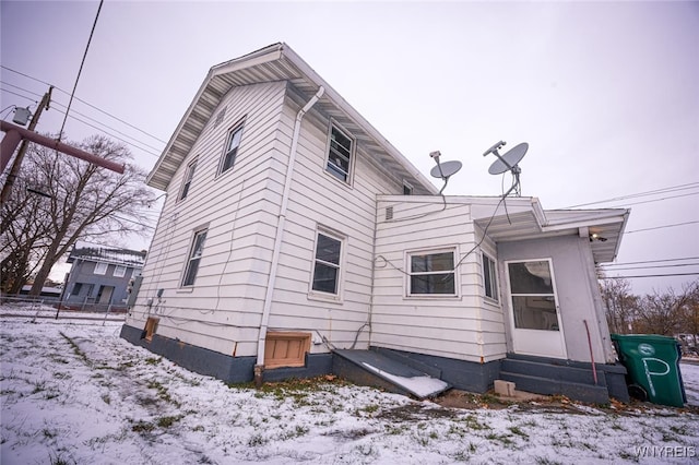 view of snow covered property