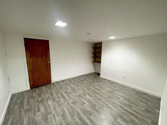 spare room with light hardwood / wood-style flooring