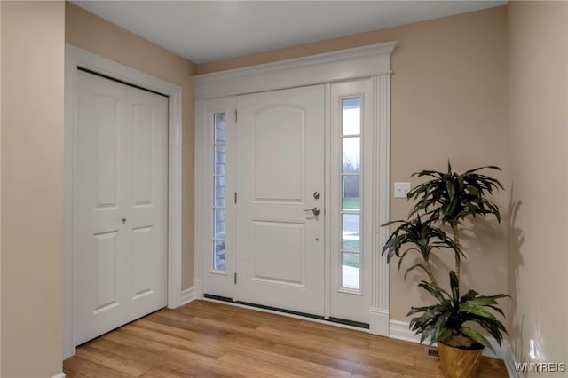 entrance foyer with light hardwood / wood-style floors