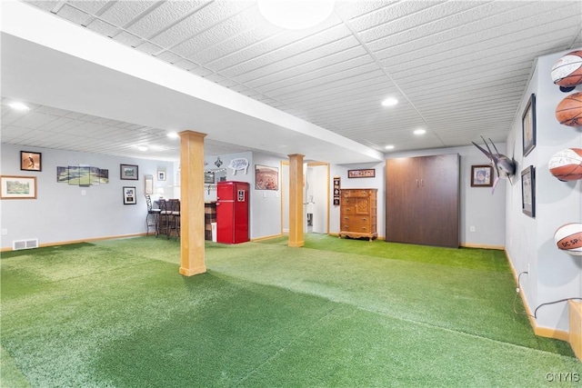 basement featuring carpet flooring