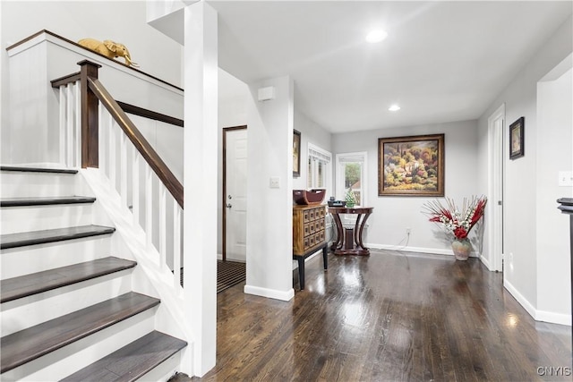 entrance foyer with dark hardwood / wood-style flooring