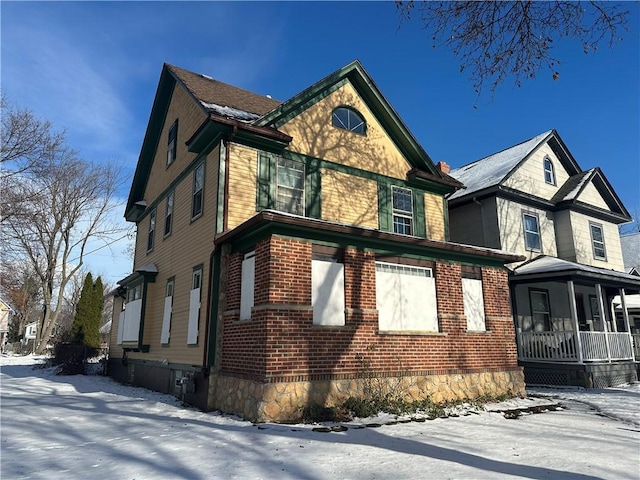 view of snow covered property