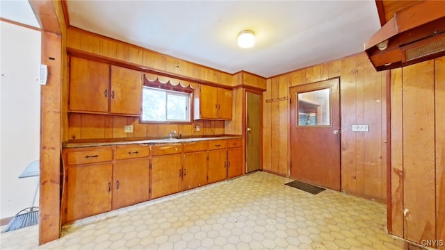 kitchen with wood walls