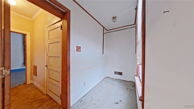 interior space with crown molding