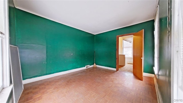 empty room featuring parquet flooring