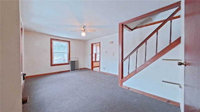 carpeted empty room with ceiling fan