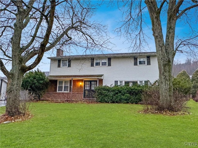 view of front of property with a front lawn