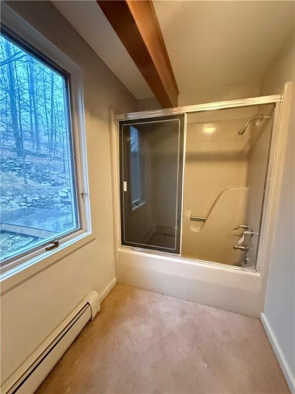 bathroom with combined bath / shower with glass door and a baseboard radiator