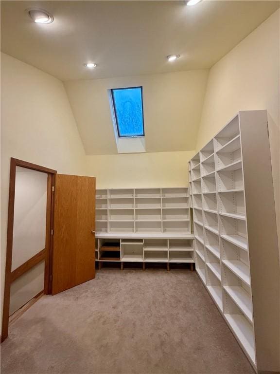 walk in closet featuring carpet floors