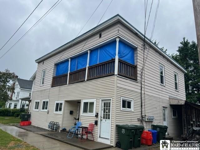 rear view of property with a patio