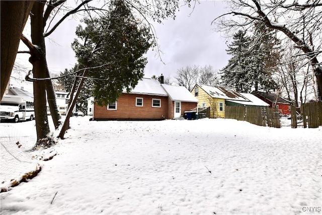 view of snow covered property