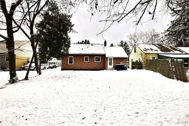 view of snow covered house