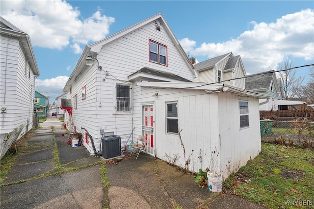 view of home's exterior featuring cooling unit