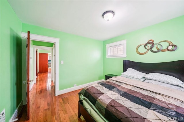 bedroom featuring hardwood / wood-style floors