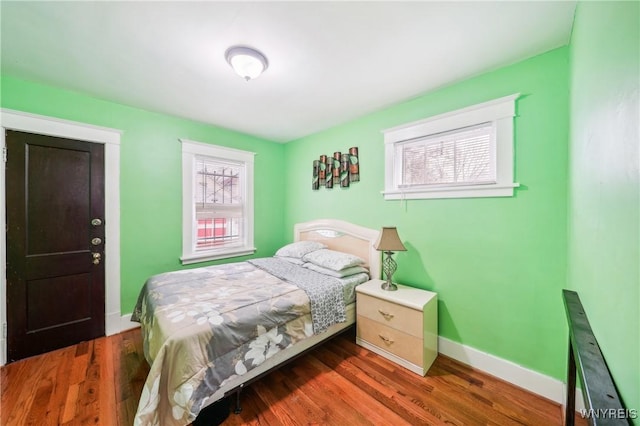 bedroom featuring dark hardwood / wood-style floors