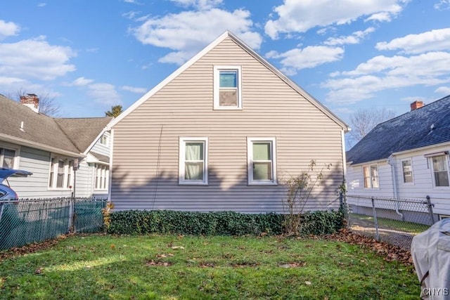 view of property exterior featuring a yard