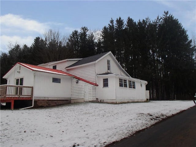 view of front of house with a wooden deck