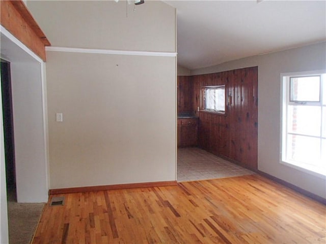 entryway with light hardwood / wood-style floors and a wealth of natural light