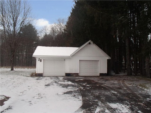 view of snow covered garage