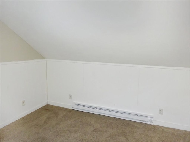 bonus room featuring carpet floors, baseboard heating, and vaulted ceiling