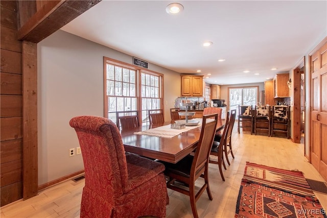 dining area featuring recessed lighting, baseboards, and light wood-style floors