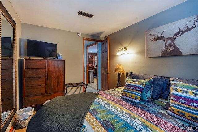 bedroom with visible vents