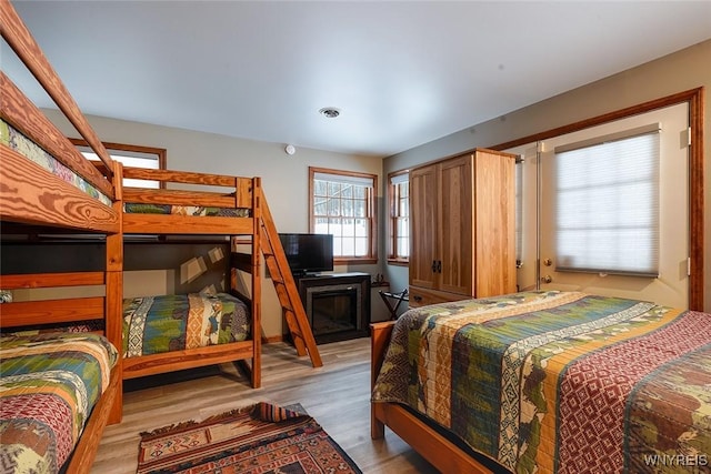 bedroom featuring light wood finished floors