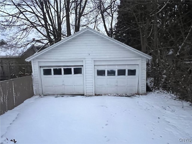 view of snow covered garage