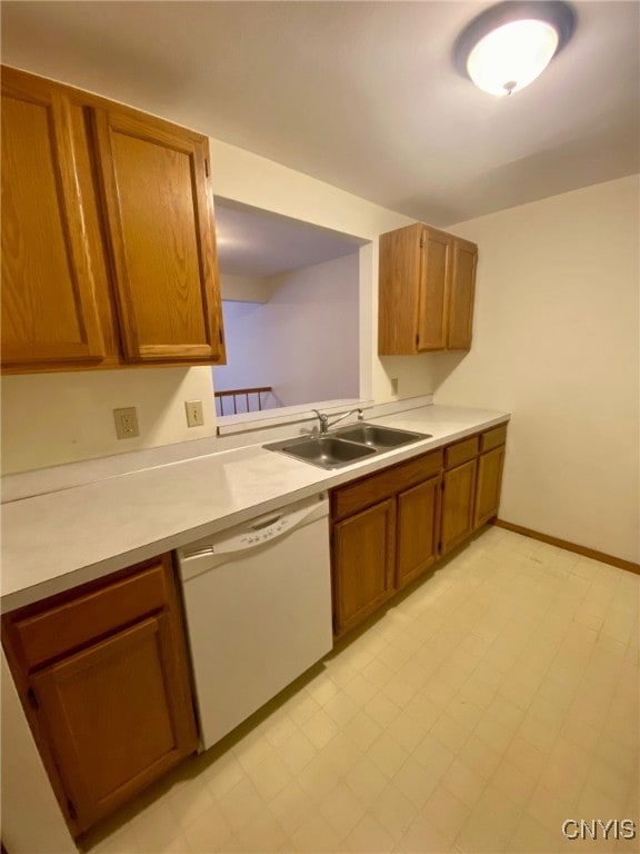 kitchen featuring dishwasher and sink