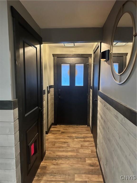 doorway featuring hardwood / wood-style floors