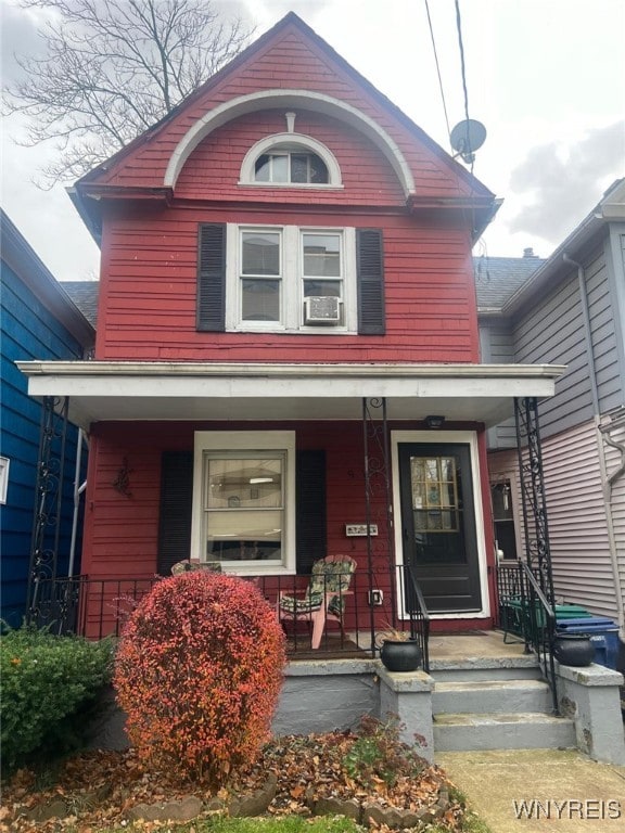 view of front of home with cooling unit